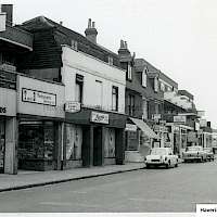 "North Street, Romford c.1965: This 1960s view of North Street begins with 31-33, North Street and the Radio, Television and Record Shop of A. H. Silcocks and Son next door to T & B Photographic at 35, North Street."