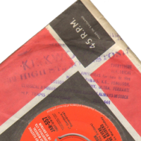 Paper record sleeve stamped with the Kirkwoods address.